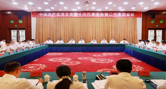 蒋曦黄韡李朝晖钱界殊孙艳辉等分别参加各代表团讨论